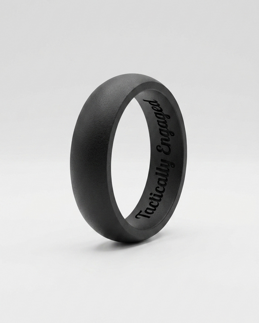 Black silicone ring with 'Tactically Engaged' text on a white background