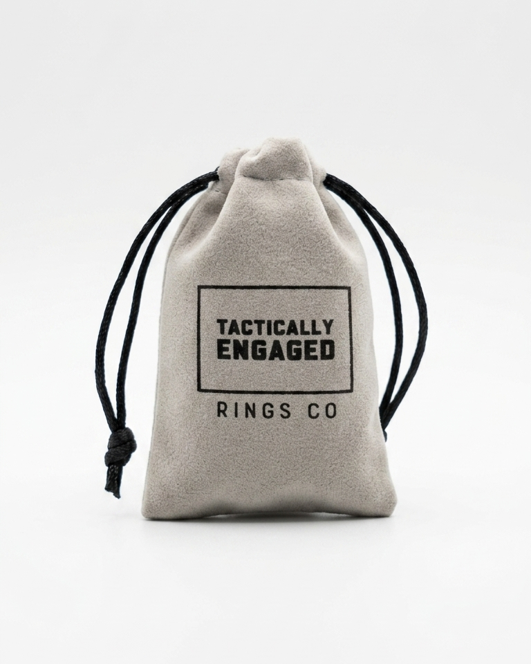 Gray drawstring bag with 'Tactically Engaged Rings Co' branding on a white background