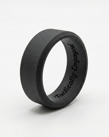 Black Silicone ring with 'Tactically Engaged' engraving on a white background